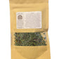 Brown paper bag of tea with label and window to see the loose leaf herbs.